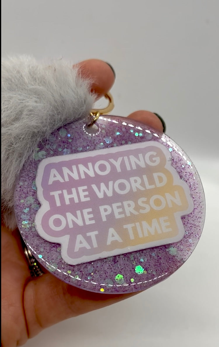 Annoying the world one person at a time Keychain